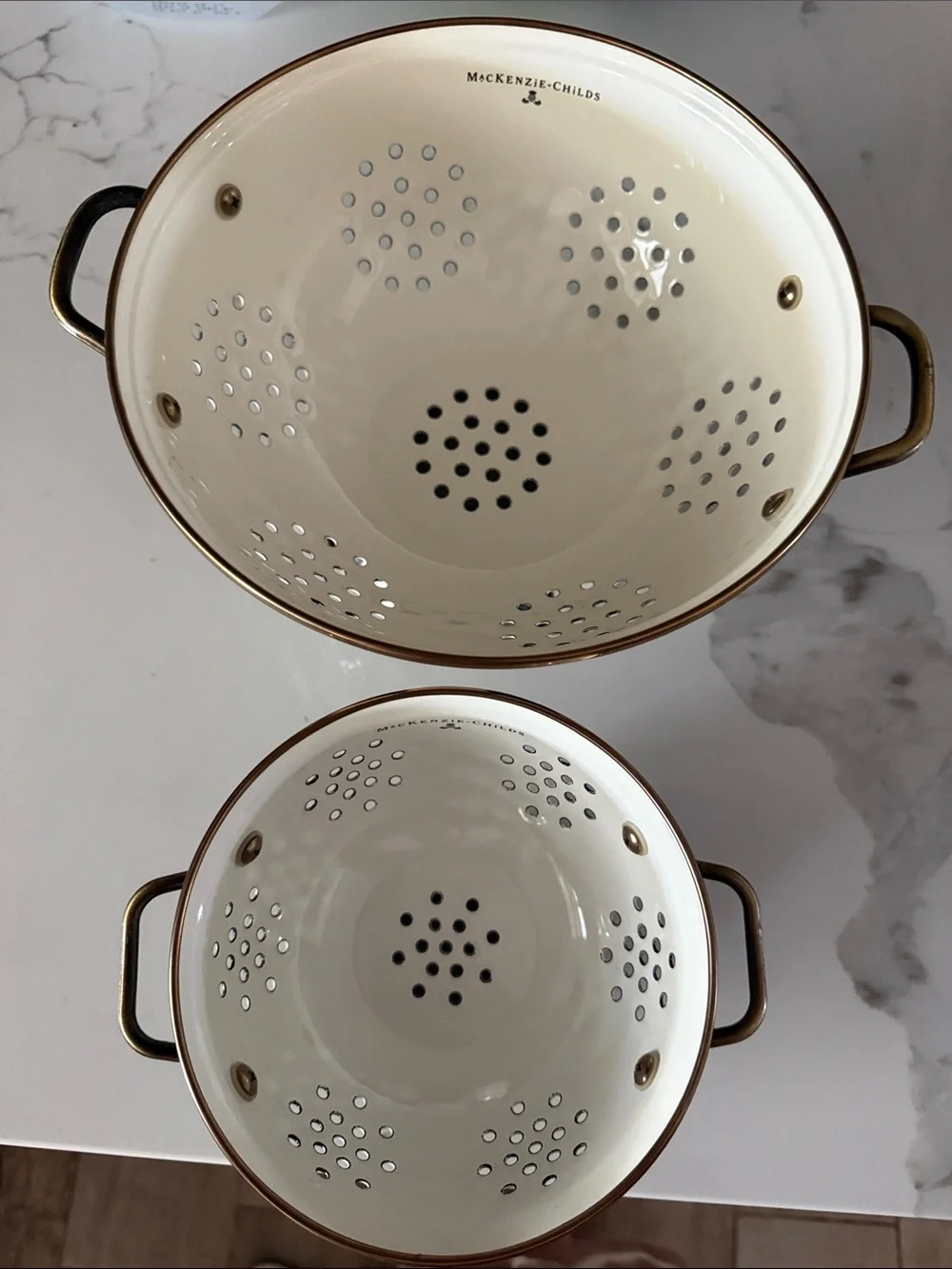 McKenzie Childs Enamel Colanders.Cream with Bronze Trim. Set of 2 Pieces Bk & Wh